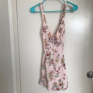 Lush light pink floral romper with front tie summer beach